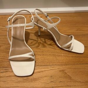 Reformation Genni Strappy Skinny Heel Sandal in white patent
